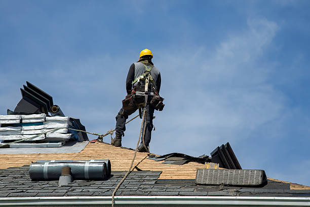 Professional Roof Replacement technician working in Maynard, MA